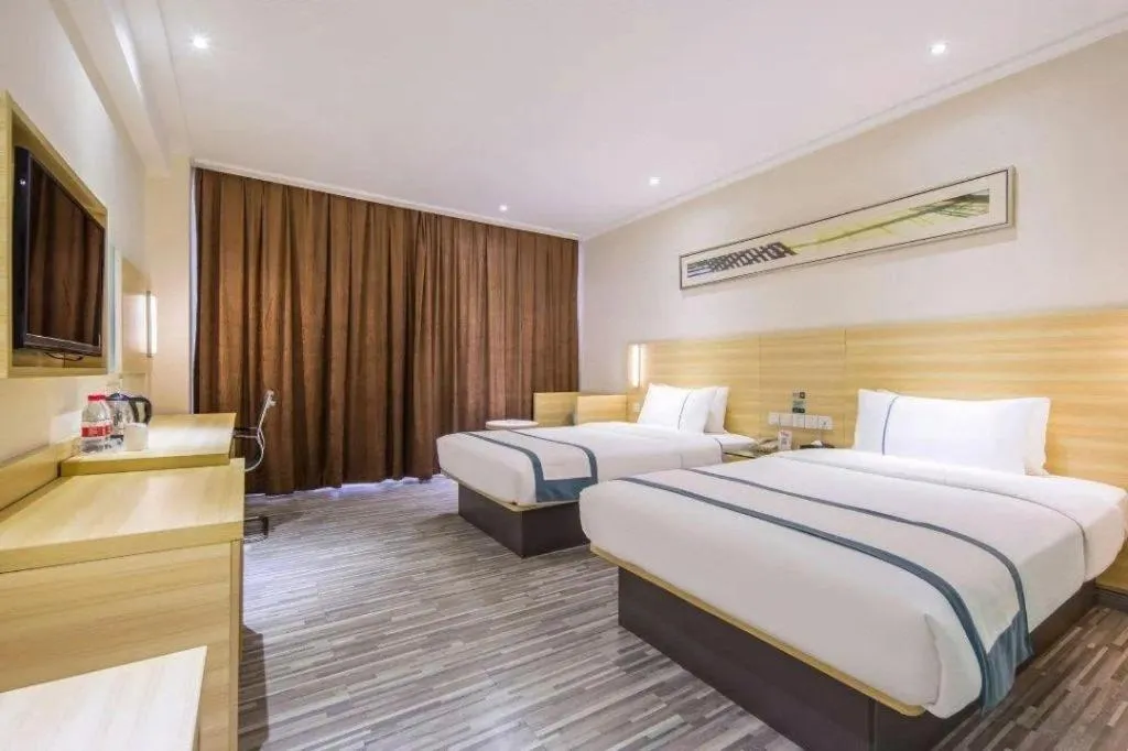 Bed in City Comfort Inn Zhuhai Hengqin Ocean Kingdom Huafa Shangdu
