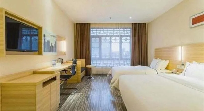 Bed in City Comfort Inn Zhuhai Hengqin Ocean Kingdom Huafa Shangdu