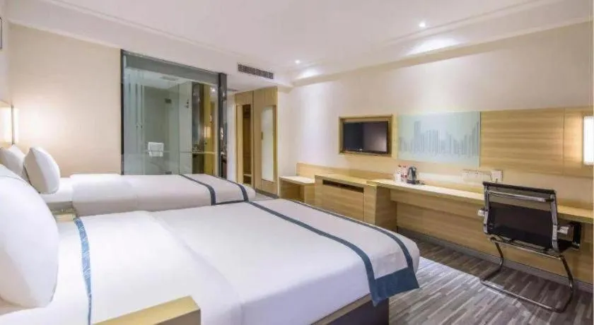 Bed in City Comfort Inn Zhuhai Hengqin Ocean Kingdom Huafa Shangdu