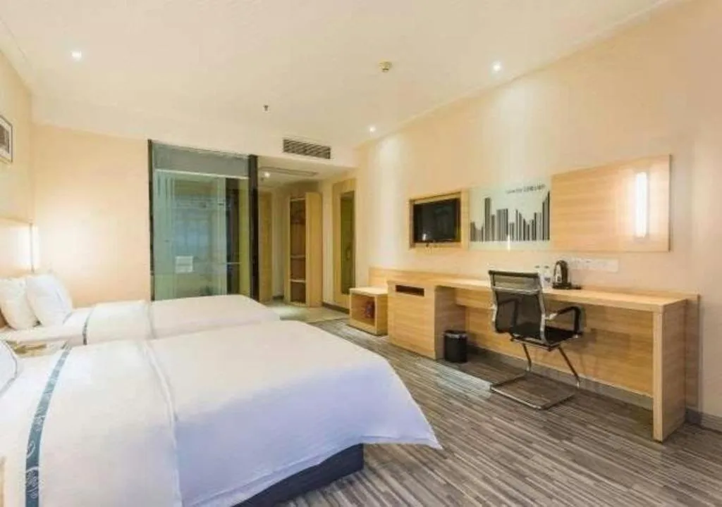 Bed in City Comfort Inn Zhuhai Hengqin Ocean Kingdom Huafa Shangdu