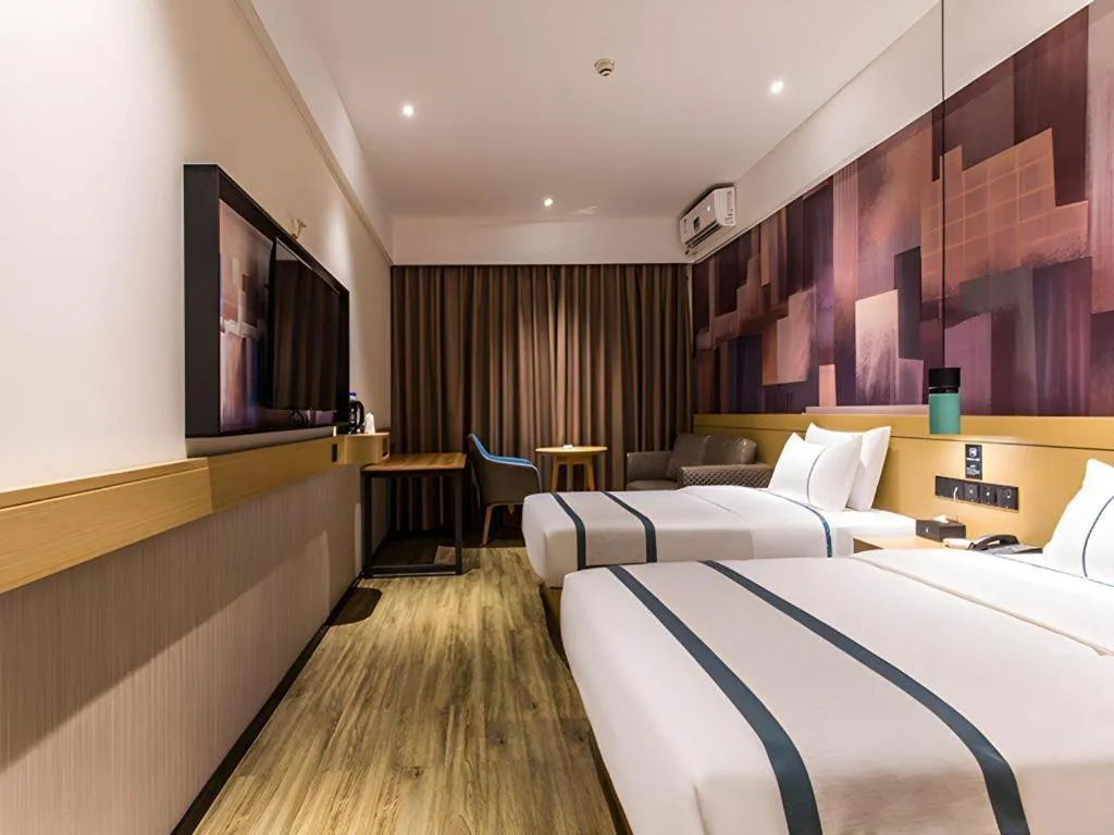 Bed in City Comfort Inn Liuzhou Wuling Liutai Road