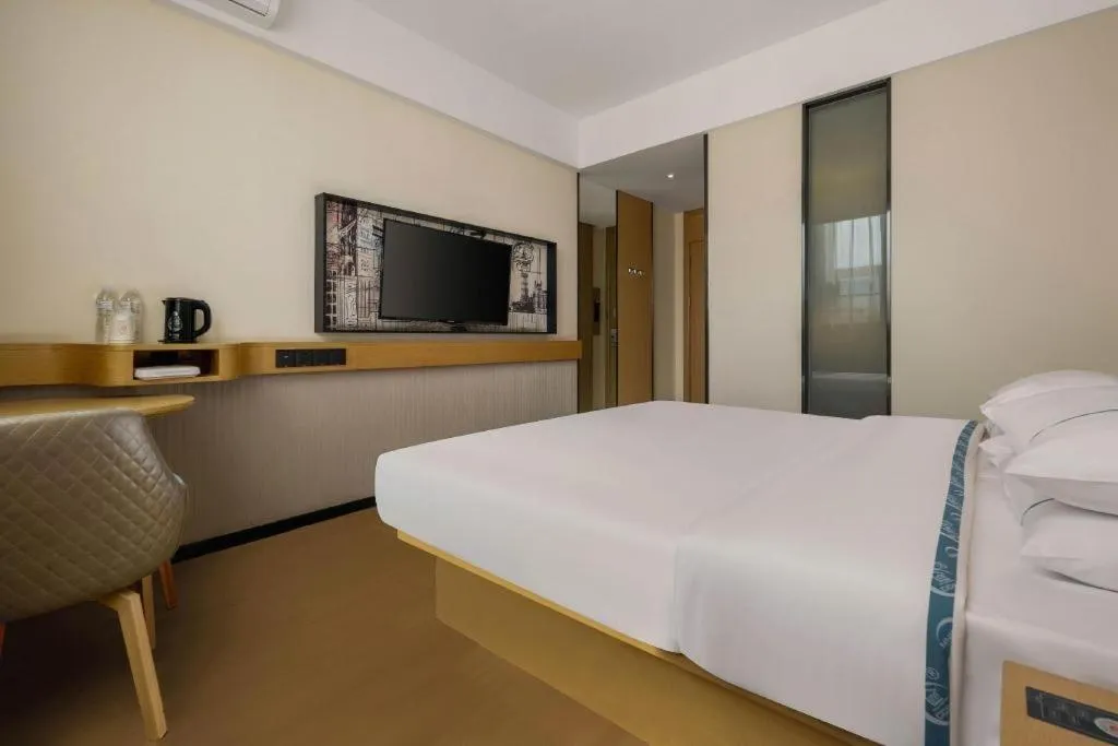 Bed in City Comfort Inn Liuzhou Wuling Liutai Road