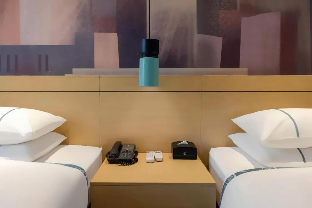 Bed in City Comfort Inn Liuzhou Wuling Liutai Road