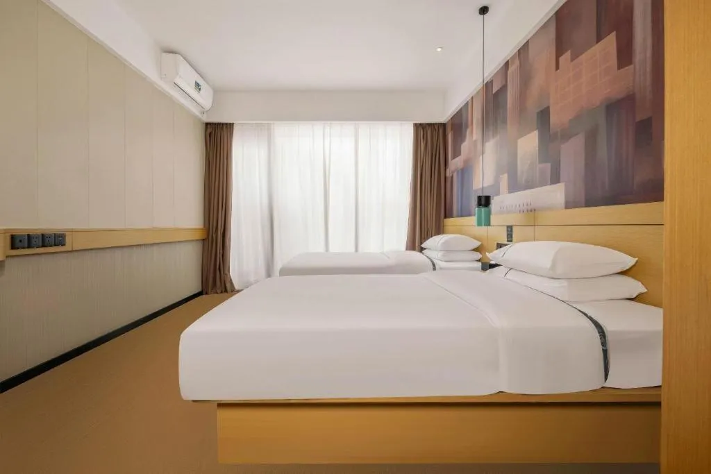 Bed in City Comfort Inn Liuzhou Wuling Liutai Road