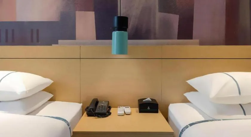 Bed in City Comfort Inn Liuzhou Wuling Liutai Road