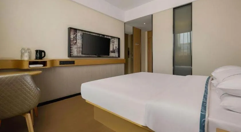 Bed in City Comfort Inn Liuzhou Wuling Liutai Road