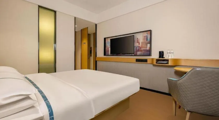 Bed in City Comfort Inn Liuzhou Wuling Liutai Road