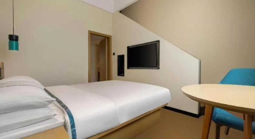 Bed in City Comfort Inn Liuzhou Wuling Liutai Road