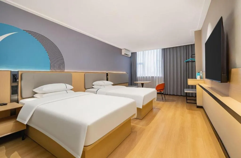 Bed in City Comfort Inn Nanning Wuming Xiangshan Avenue