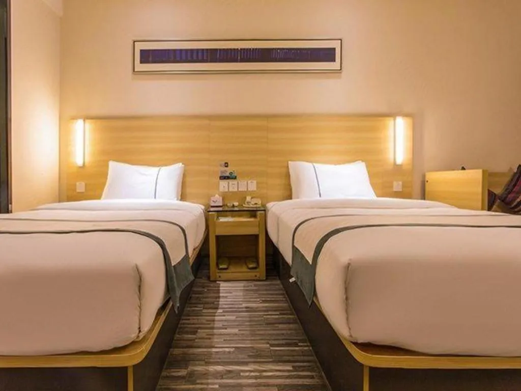 Bed in City Comfort Inn Nanning Wuming Xiangshan Avenue