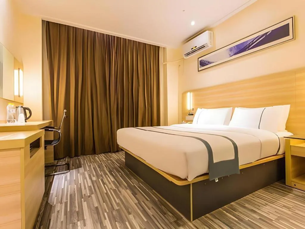Bed in City Comfort Inn Nanning Wuming Xiangshan Avenue