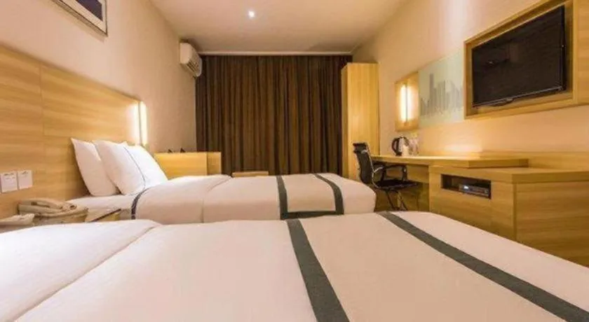 Bed in City Comfort Inn Nanning Wuming Xiangshan Avenue