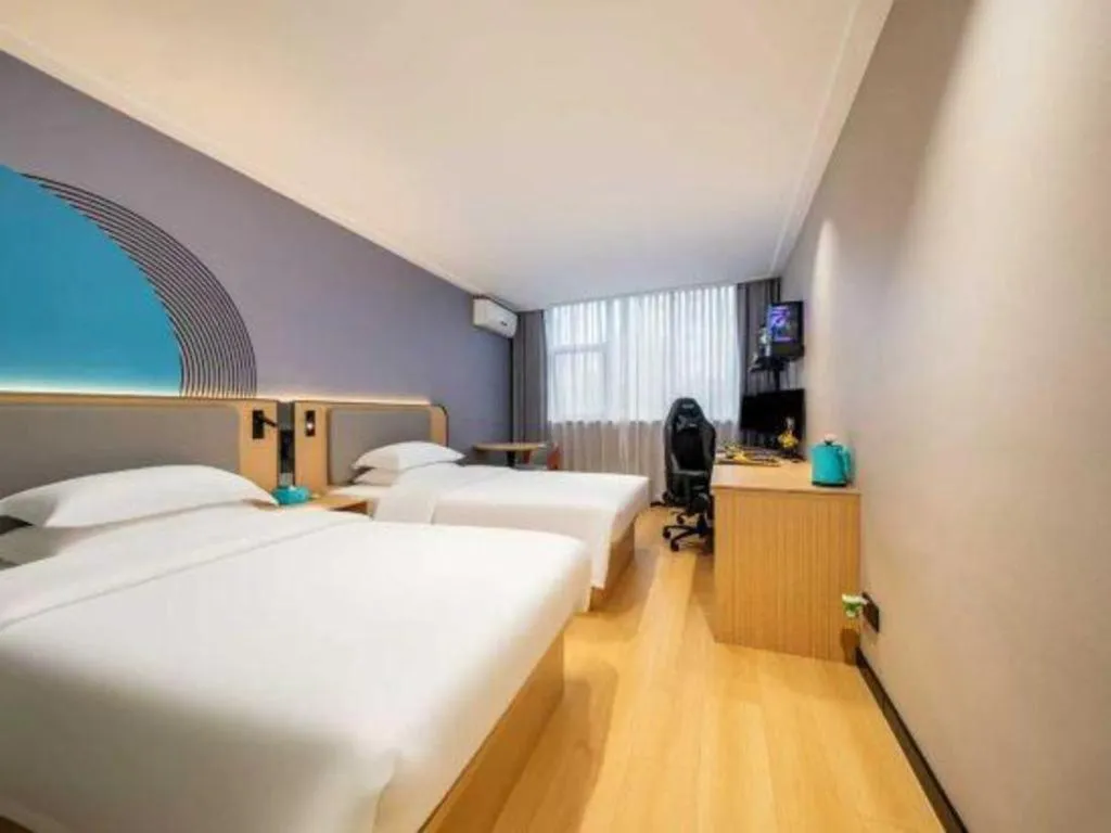 Bed in City Comfort Inn Nanning Wuming Xiangshan Avenue