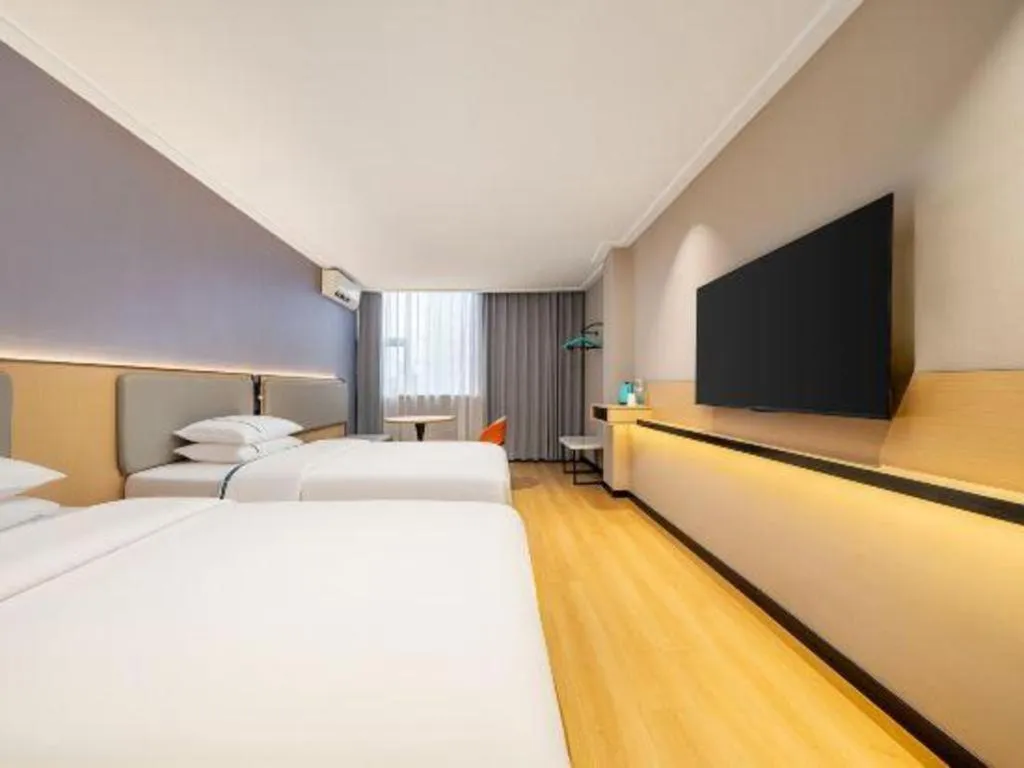 Bed in City Comfort Inn Nanning Wuming Xiangshan Avenue