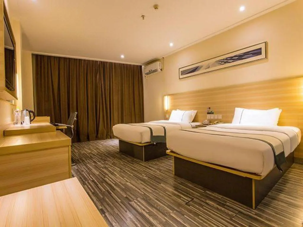 Bed in City Comfort Inn Nanning Wuming Xiangshan Avenue