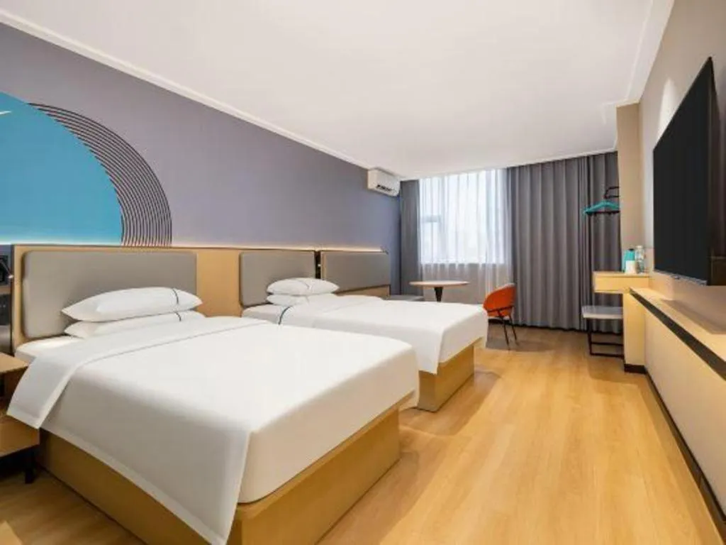 Bed in City Comfort Inn Nanning Wuming Xiangshan Avenue