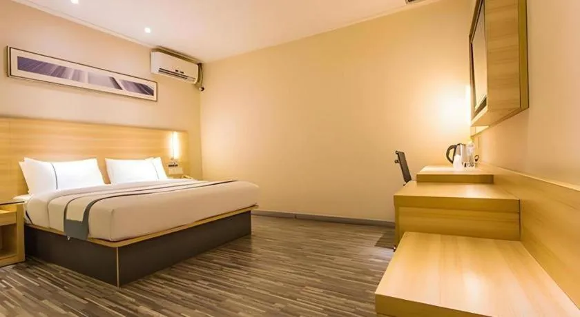 Bed in City Comfort Inn Nanning Wuming Xiangshan Avenue