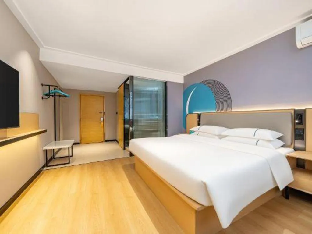 Bed in City Comfort Inn Nanning Wuming Xiangshan Avenue