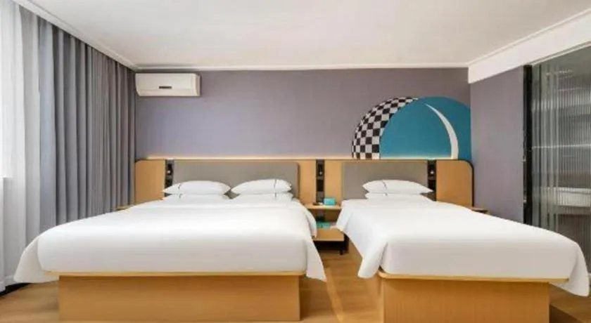 Bed in City Comfort Inn Nanning Wuming Xiangshan Avenue