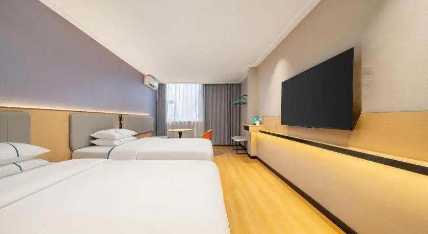 Bed in City Comfort Inn Nanning Wuming Xiangshan Avenue