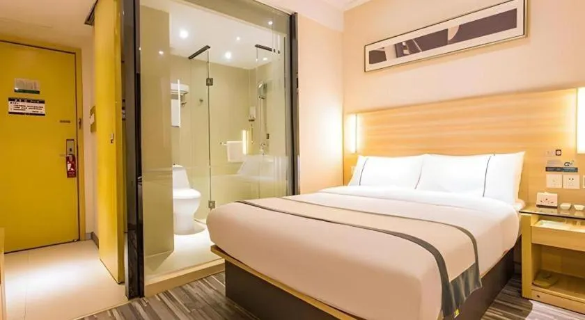 Bed in City Comfort Inn Nanning Wuming Xiangshan Avenue