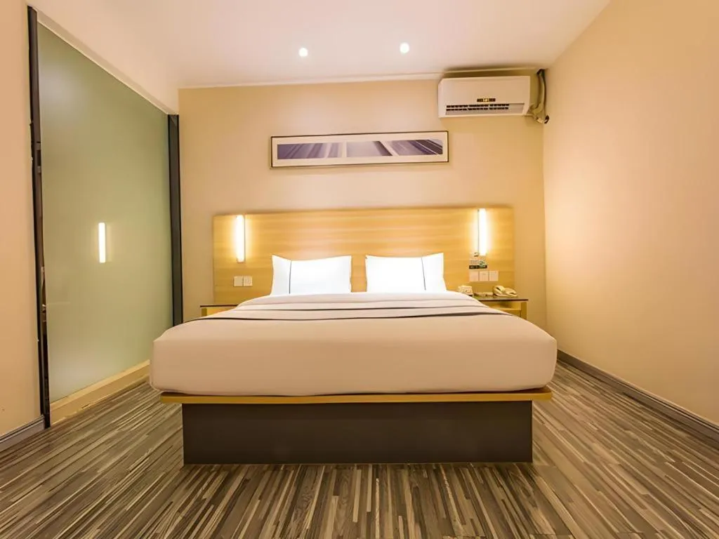 Bed in City Comfort Inn Nanning Wuming Xiangshan Avenue