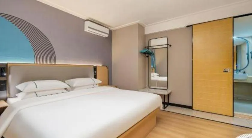 Bed in City Comfort Inn Nanning Wuming Xiangshan Avenue