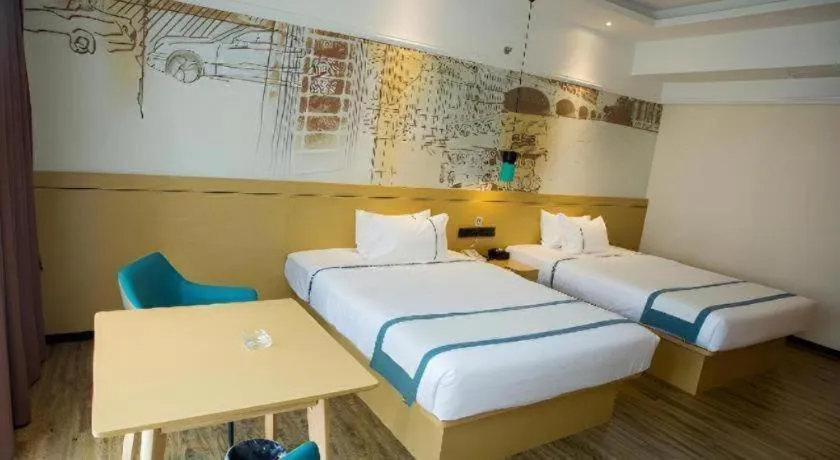 Bed in City Comfort Inn Huizhou Longmen