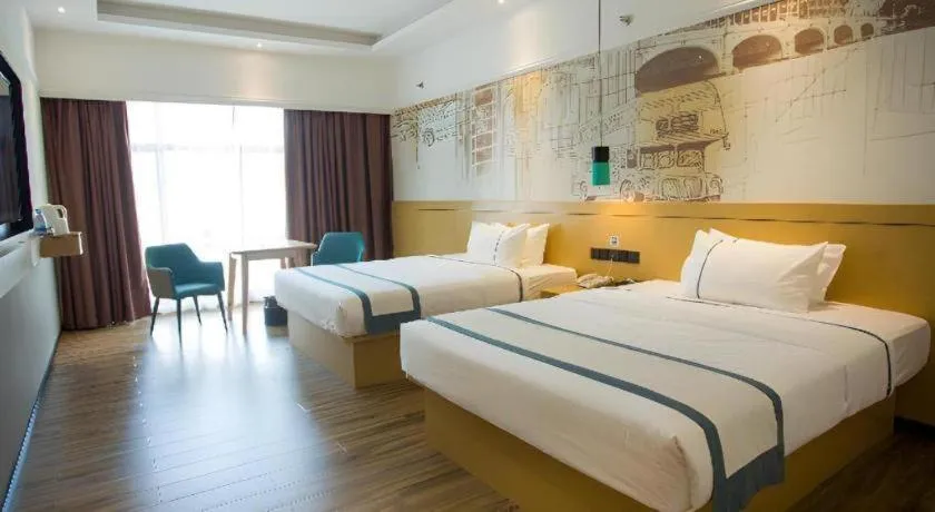 Bed in City Comfort Inn Huizhou Longmen