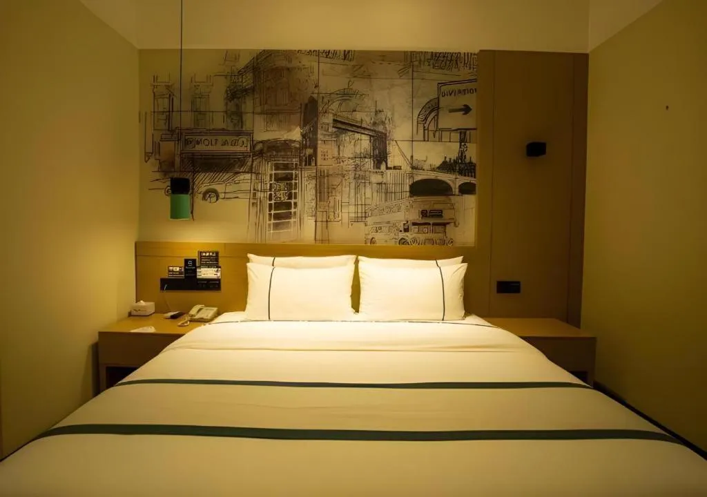 Bed in City Comfort Inn Huanggang Macheng City Mo'ercheng