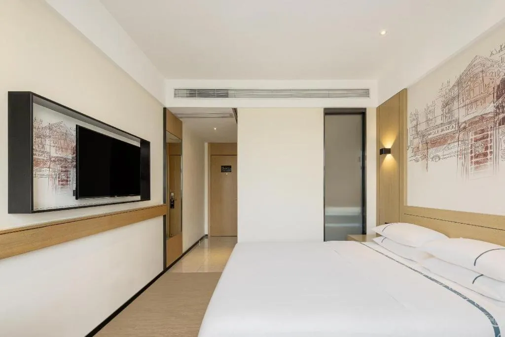 Bed in City Comfort Inn Huanggang Macheng City Mo'ercheng