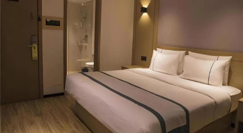 Bed in City Comfort Inn Hainan Tunchang Changsheng Road