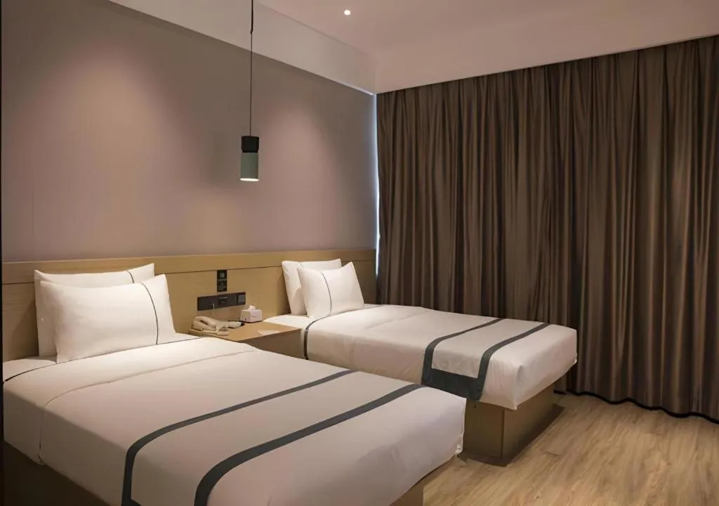 Bed in City Comfort Inn Hainan Tunchang Changsheng Road