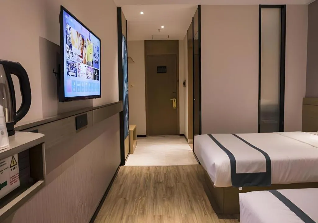 Bed in City Comfort Inn Hainan Tunchang Changsheng Road