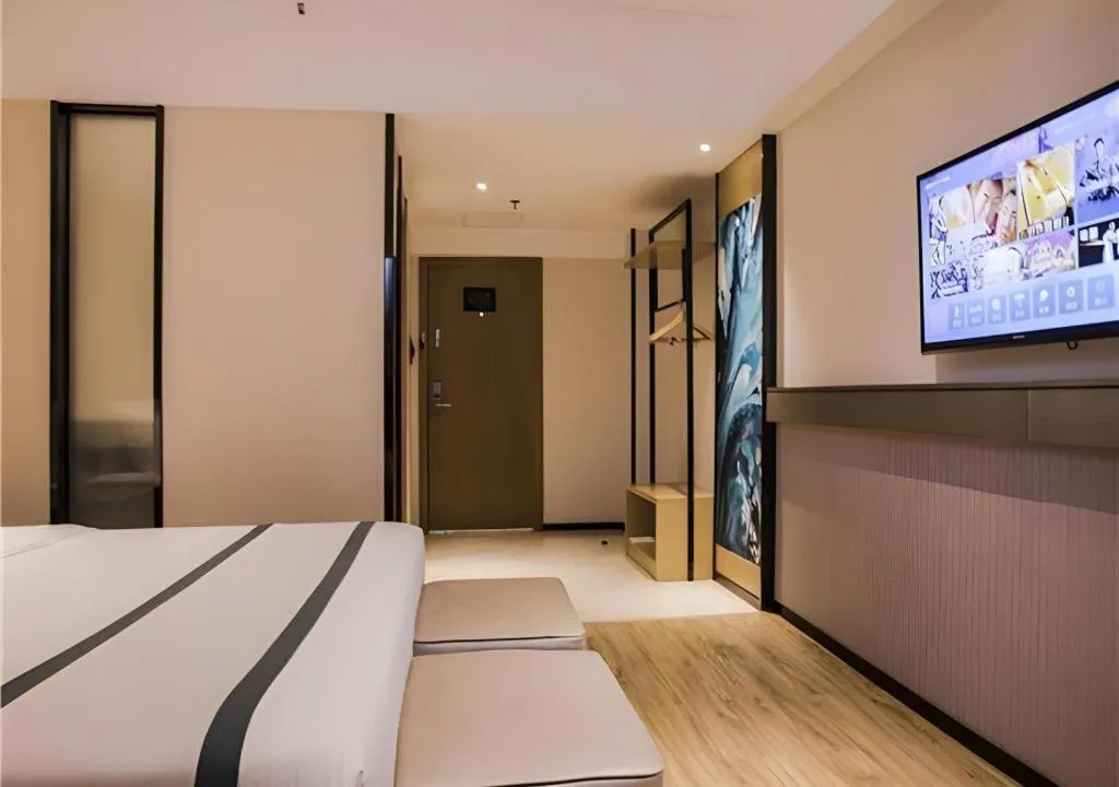 Bed in City Comfort Inn Hainan Tunchang Changsheng Road