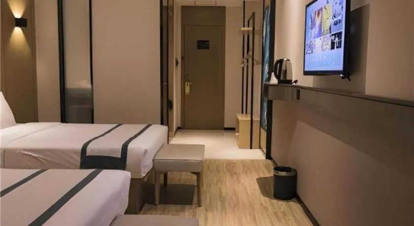 Bed in City Comfort Inn Hainan Tunchang Changsheng Road