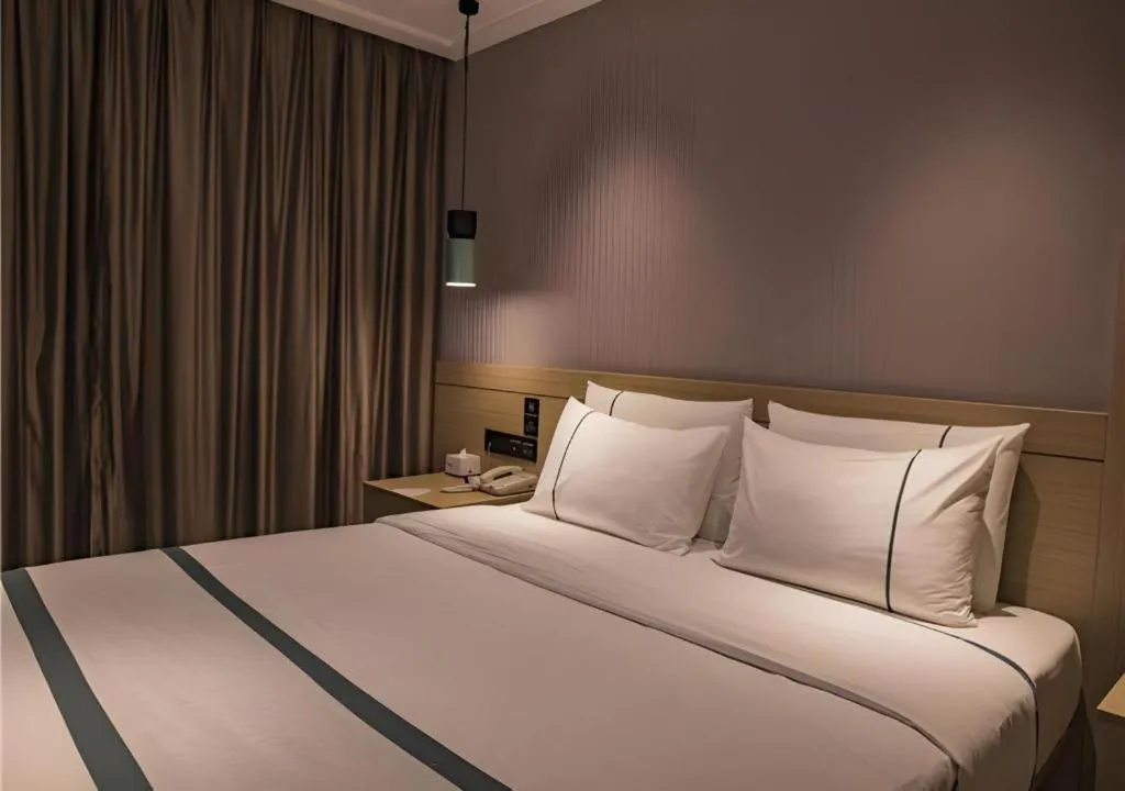 Bed in City Comfort Inn Hainan Tunchang Changsheng Road