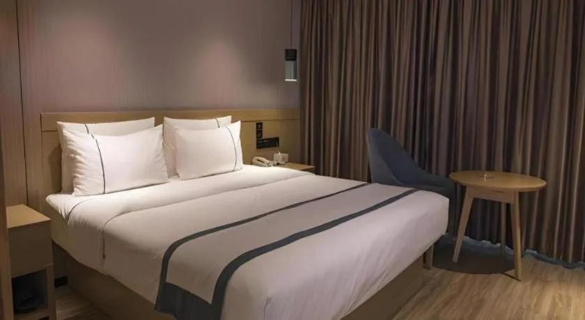 Bed in City Comfort Inn Hainan Tunchang Changsheng Road