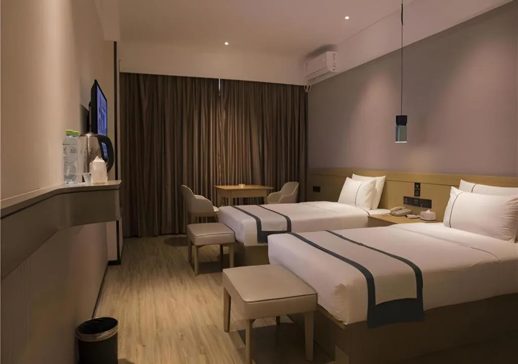 Bed in City Comfort Inn Hainan Tunchang Changsheng Road