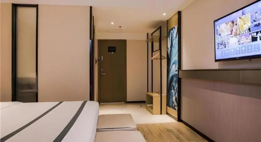 Bed in City Comfort Inn Hainan Tunchang Changsheng Road