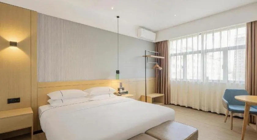 Bed in City Comfort Inn Hainan Tunchang Changsheng Road