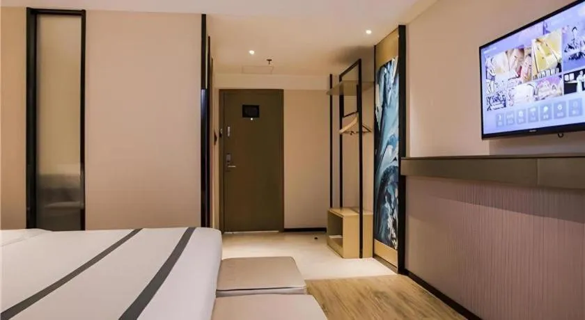 Bed in City Comfort Inn Hainan Tunchang Changsheng Road