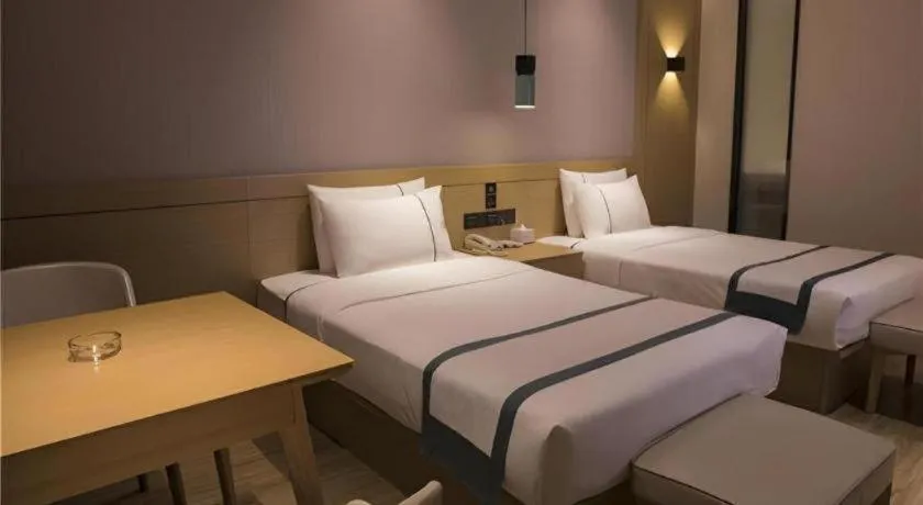 Bed in City Comfort Inn Hainan Tunchang Changsheng Road