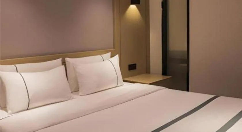 Bed in City Comfort Inn Hainan Tunchang Changsheng Road