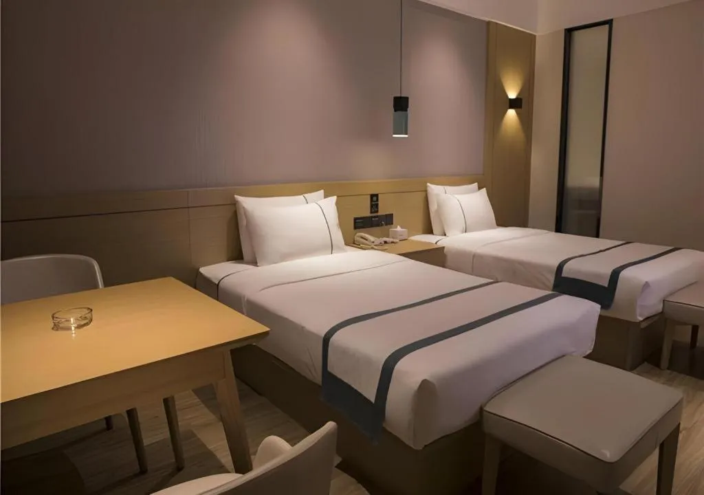 Bed in City Comfort Inn Hainan Tunchang Changsheng Road