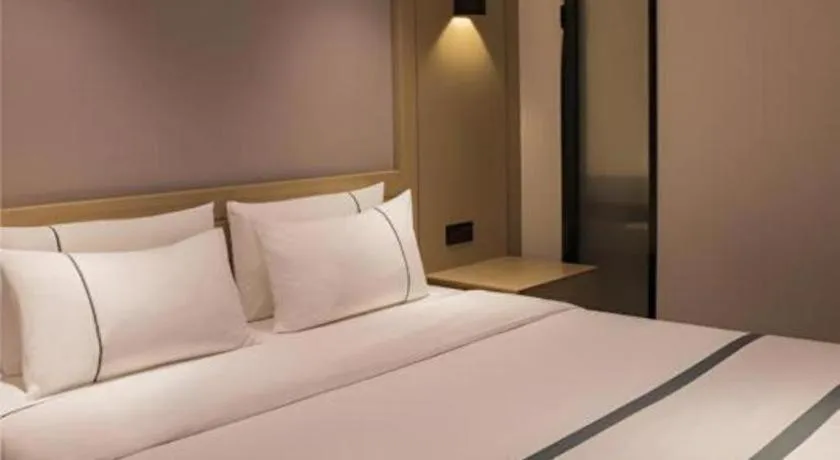 Bed in City Comfort Inn Hainan Tunchang Changsheng Road