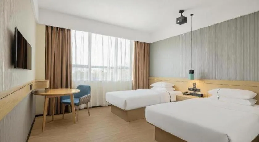 Bed in City Comfort Inn Hainan Tunchang Changsheng Road