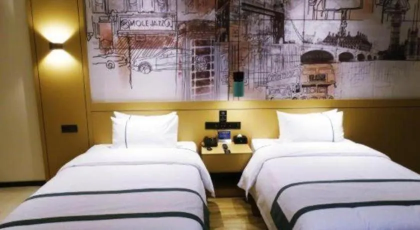 Bed in City Comfort Inn Meishan Wanda Plaza