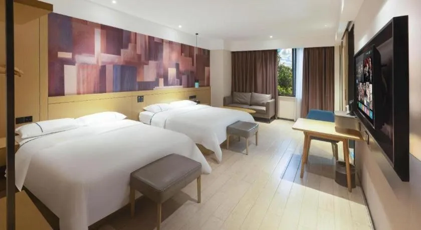 Bed in City Comfort Inn Meishan Wanda Plaza