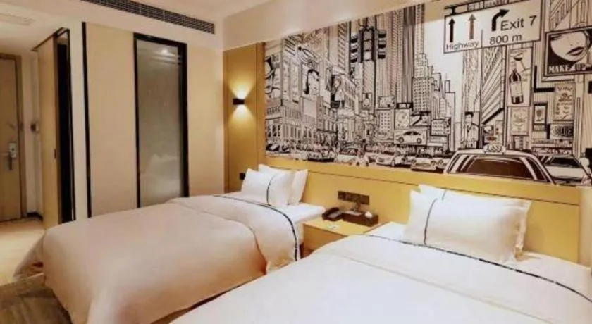 Bed in City Comfort Inn Meishan Wanda Plaza